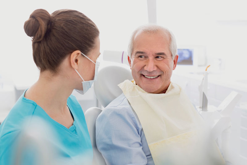 Dental Patient Smiling After Implant Procedure