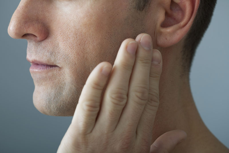 Dental Patient Suffering From Jaw Pain