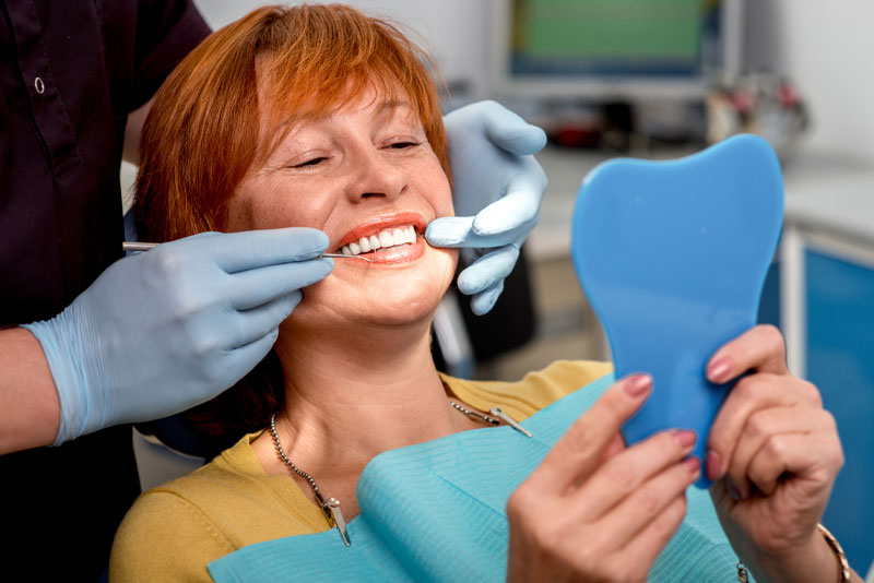 Full Arch Dental Implant Patient Getting Her Dental Procedure Done