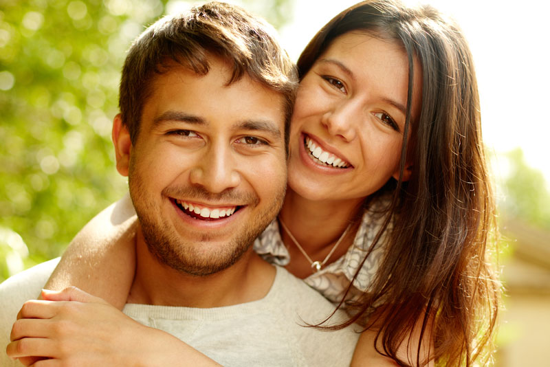 Dental Patients Smiling With Well Cared For Dental Implants In Sandwich, MA