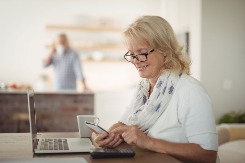 a patient determining what could affect the cost of her full mouth dental implant procedure.