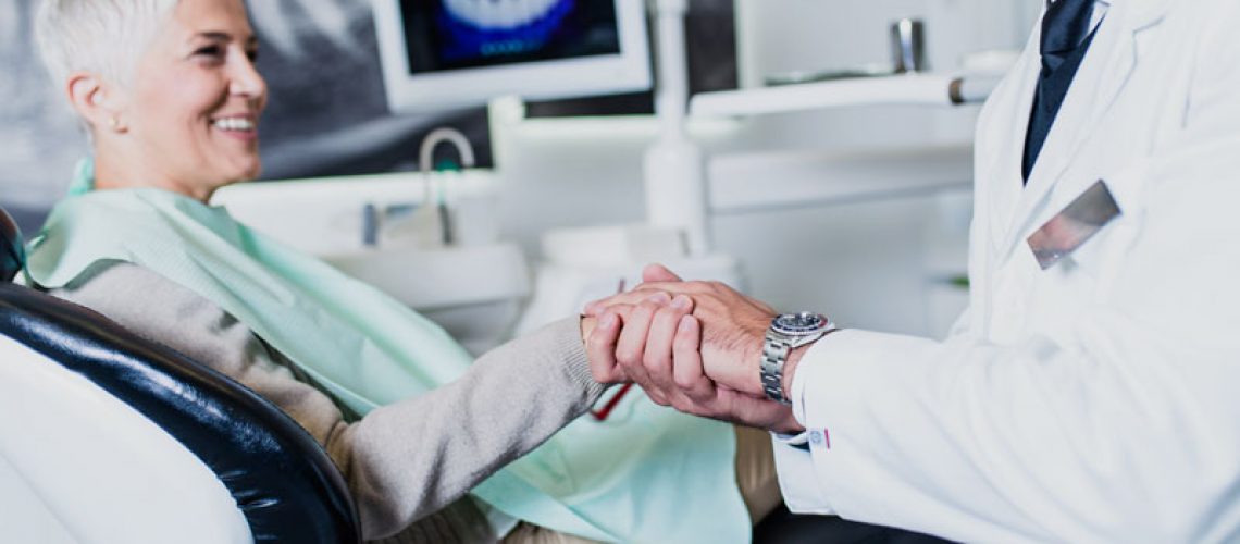 Dental Implant Patient Talking To Their Doctor