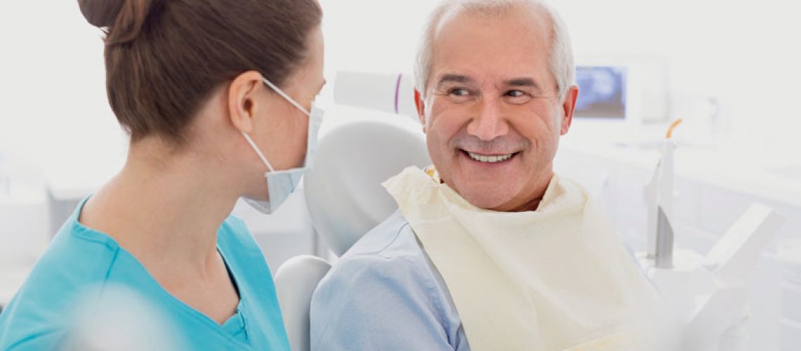 Dental Patient Smiling After Implant Procedure