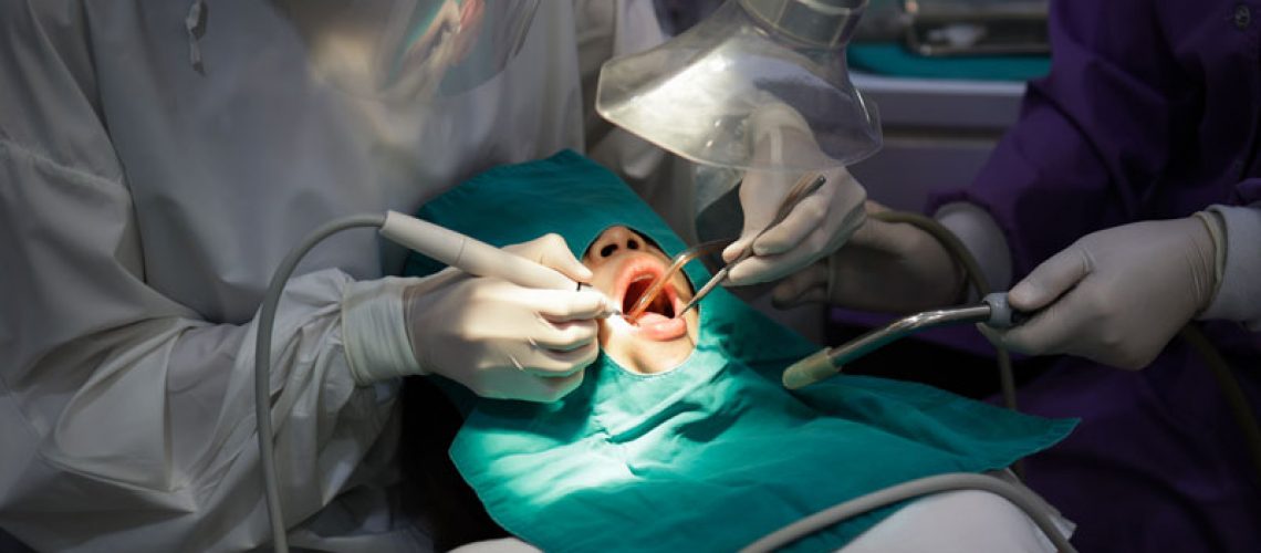 Dental Patient Undergoing An Oral Surgery Procedure