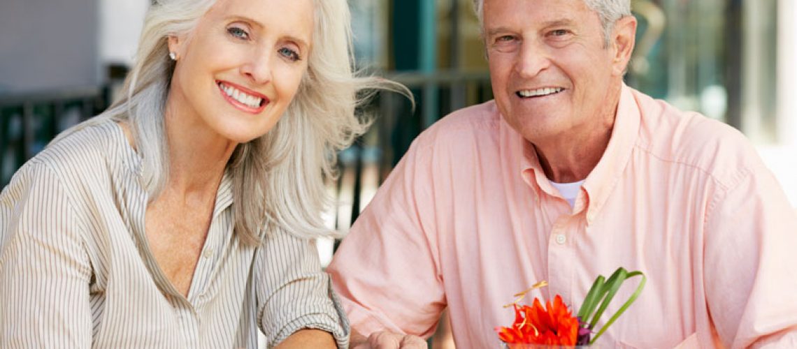 Dental Implant Patients Eating Together With Their False Teeth in Plymouth, MA